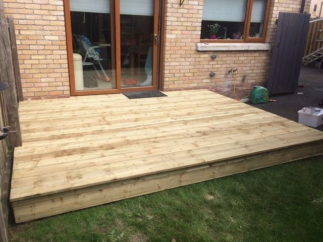 Deck constructed at the same level as the living area through the patio door