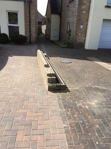 The difference a bit of power washing makes to this customer's paving 